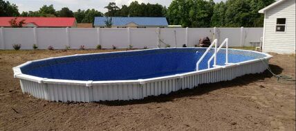 aquasport 52 pool partially buried ready for deck in North Carolina